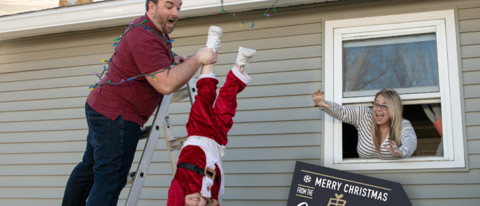 Chris Holds Will Dressed As Santa
