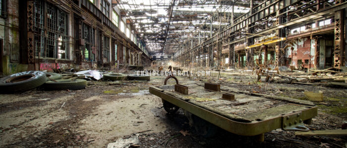 Abandoned machine cart in a closed down train assembly facility
